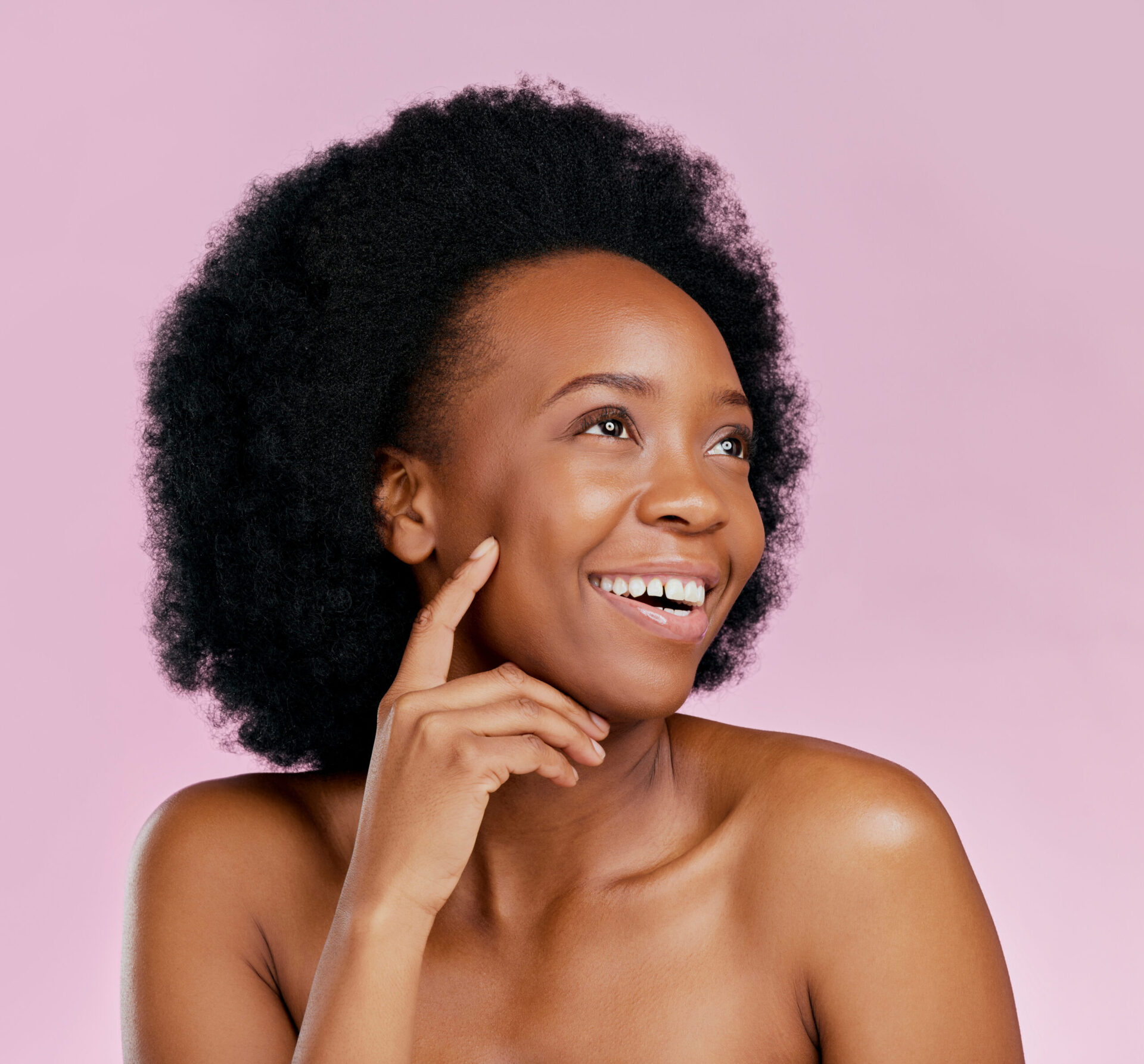 A Young African American Woman with flawless skin promoting Skin Care provided by Venus Aesthetics Temple